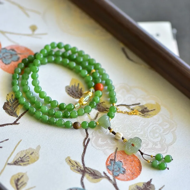 Natural Hetian jadeite bracelet three strands paired with 6mm South Red Agate beads featuring a fine texture and no black