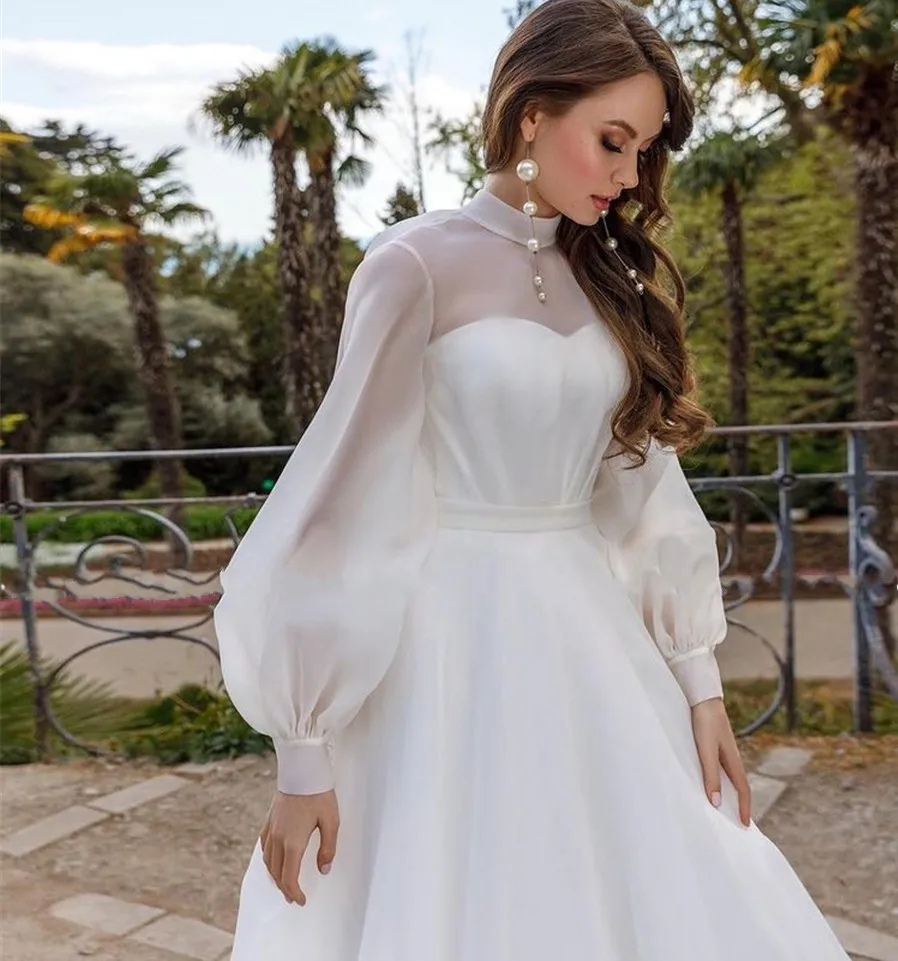 2025 A-line Abito da sposa in organza Collo ad alta illusione Maniche lunghe a sbuffo Bottoni Abiti da sposa Abiti da sposa personalizzati