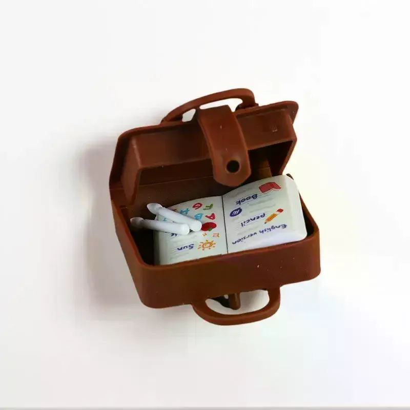 

Handcrafted 1:12 Scale Dollhouse Classroom Setting with Desk, Chalkboard, Books, and Bag for Miniature Decor Collection.