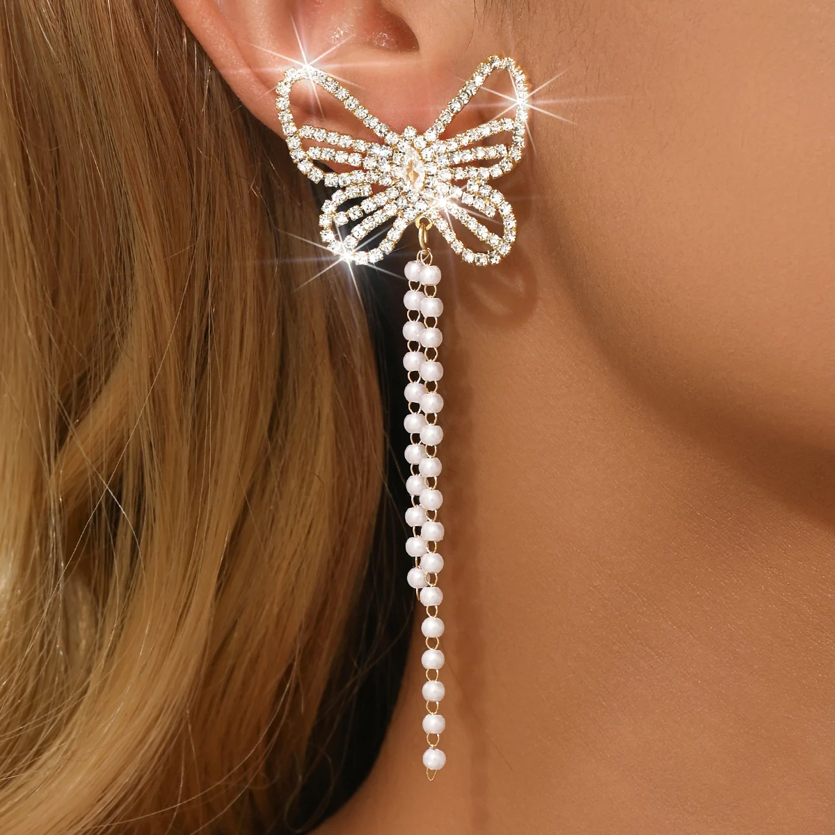 أقراط شرابة طويلة على شكل فيونكة متقاطعة للنساء، أزياء راقية، سلسلة مخالب، أقراط ماسية لامعة، أقراط للنساء