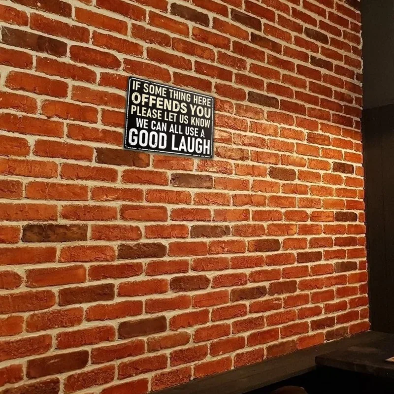 The bar sign is a 30x20x2cm iron sign that reads' If there's anything here that makes you feel uncomfortable... '