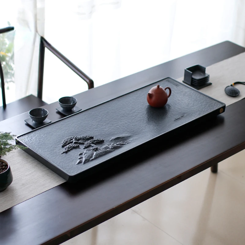 

View handmade natural black stone tea tray stone tea table simple black stone tea sea home stone tea set