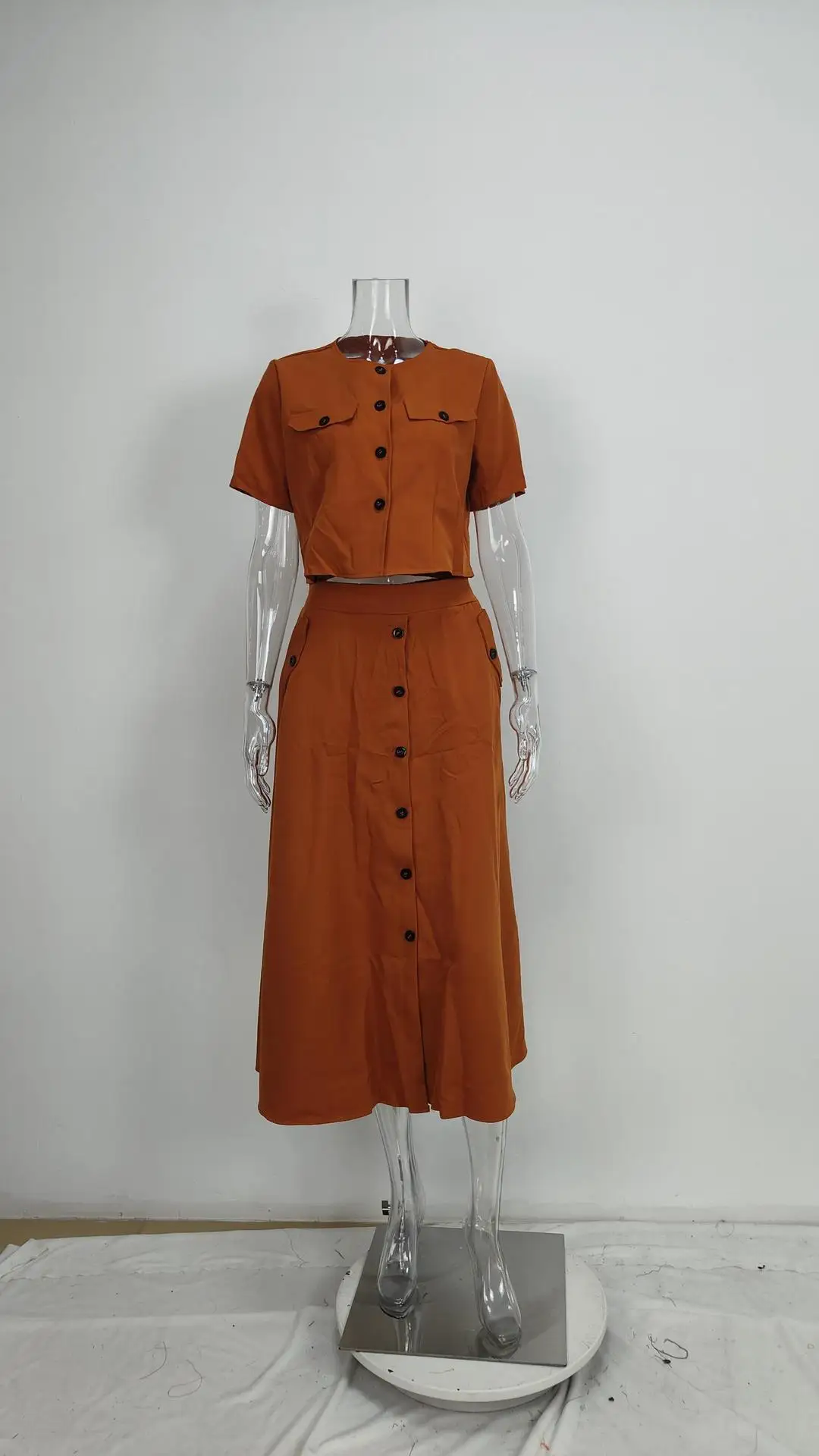 Sister Star Set Rok Kancing Sebaris Atasan Pendek Kasual Warna Polos Elegan Wanita Grosir Set Dua Potong Komuter Temperamen
