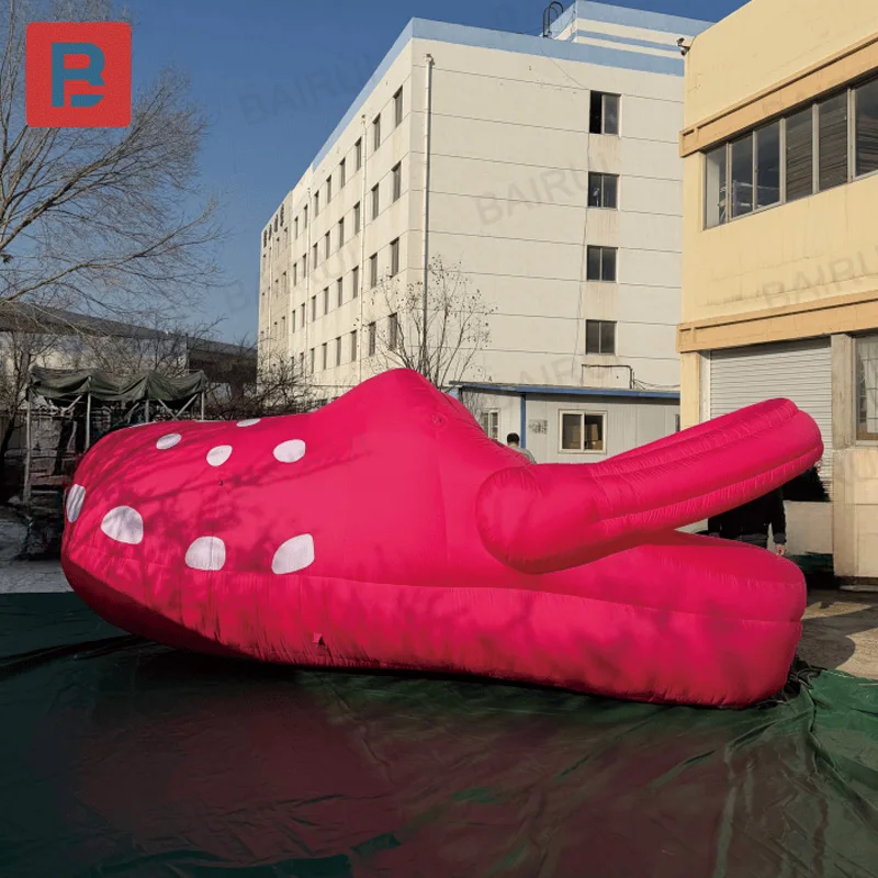 

Inflatable slippers, equipped with a blower, as an outdoor mall grassland activity decoration item