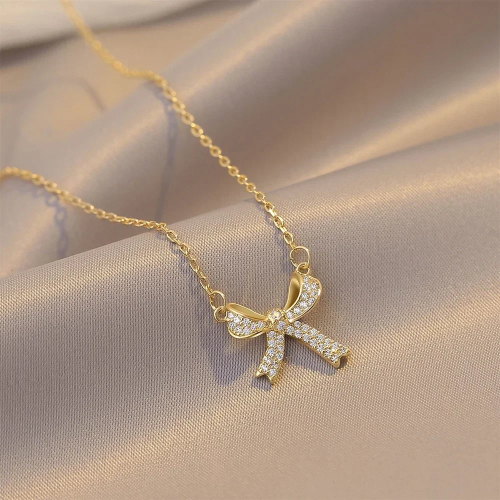 

Изысканное медное колье с подвеской-бантом, инкрустированной цирконием, для женщин и девушек, нежная цепочка на ключицу, свадебные украшения и аксессуары