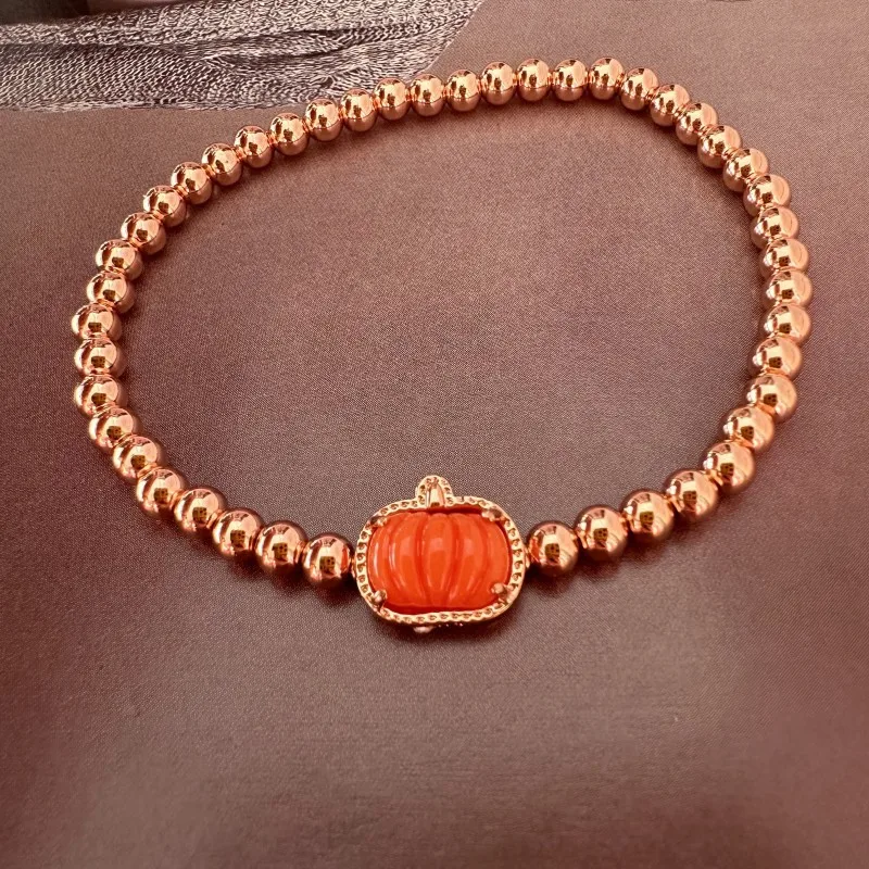 Europe and the United States fashion atmosphere sense of Halloween orange pumpkin copper ball stretch bracelet female jewelry