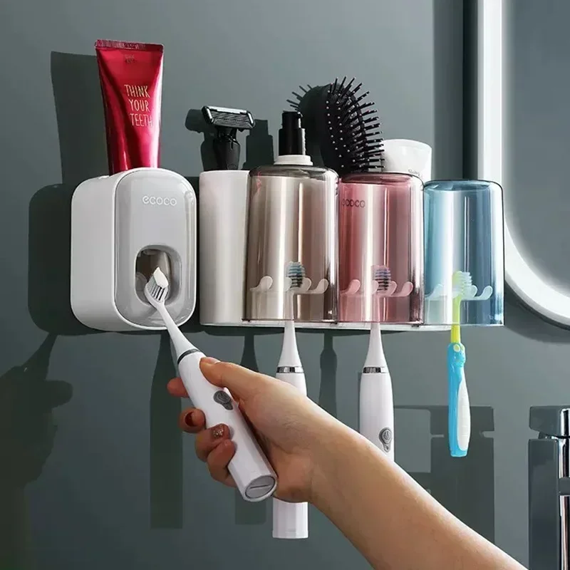 

ECOCO Bathroom Toothbrush Holder Organizer with Cup Toothpaste Squeezer Dispenser Wall Storage Rack Bathroom Accessories Shelf