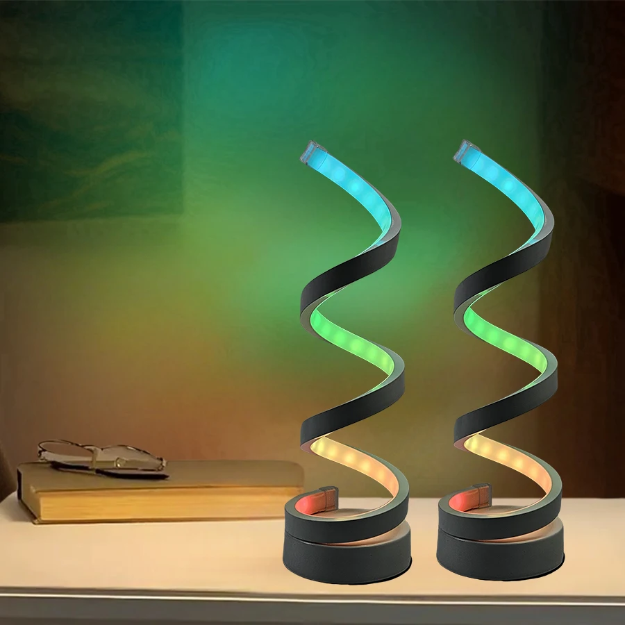 Modern spiral colorful desktop lamp with three-color dimming via USB, suitable for various types of rooms.