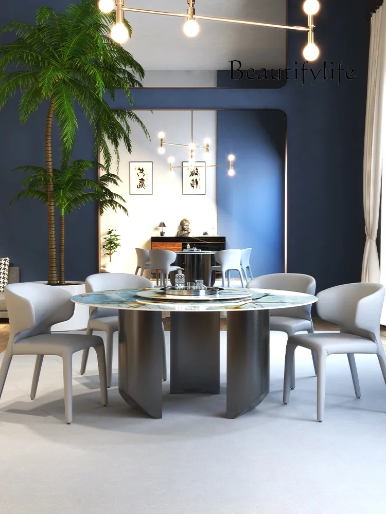 

Italian rock slab dining table and chairs round Nordic marble round table light luxury modern home dining table