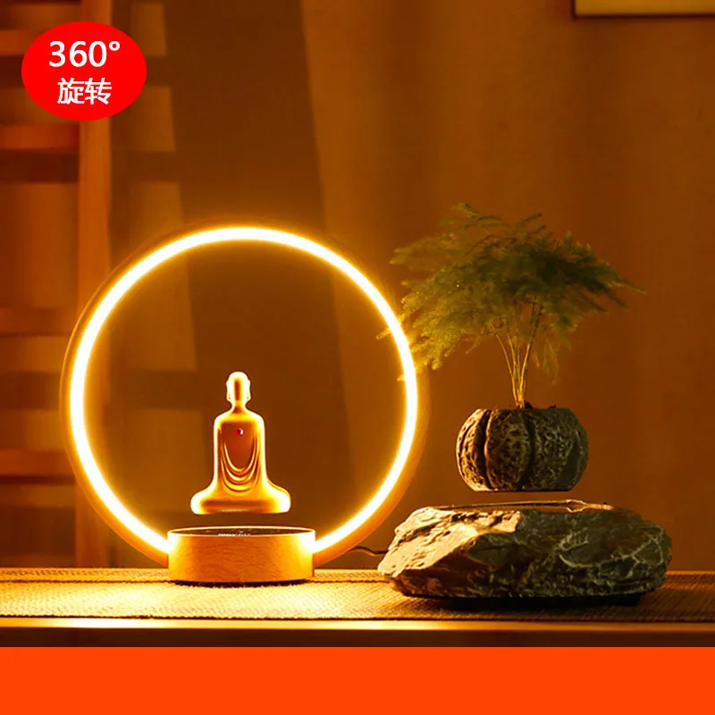 

Magnetic Levitation Gold-Plated Faceless Buddha Statue Rotating Led Luminous Circular Table Lamp Zen Meditation Buddha Statue