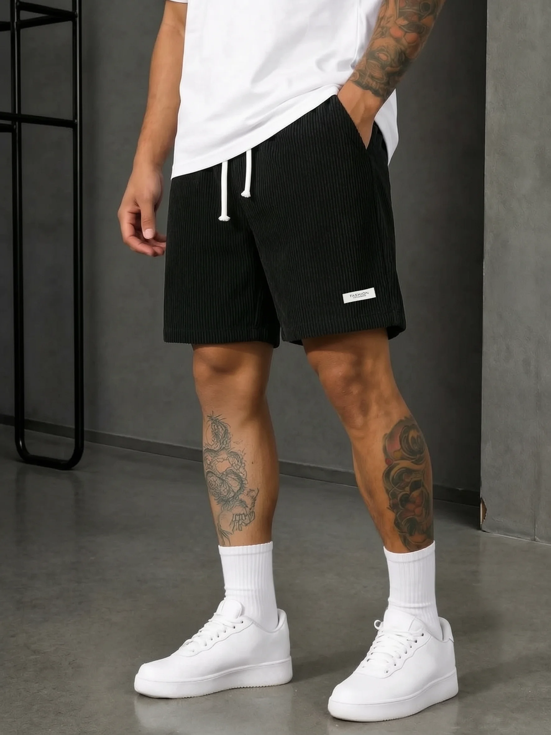 Men corduroy shorts with drawstring waist, loose straight fit, small label decor. Soft comfy for summer daily street wear