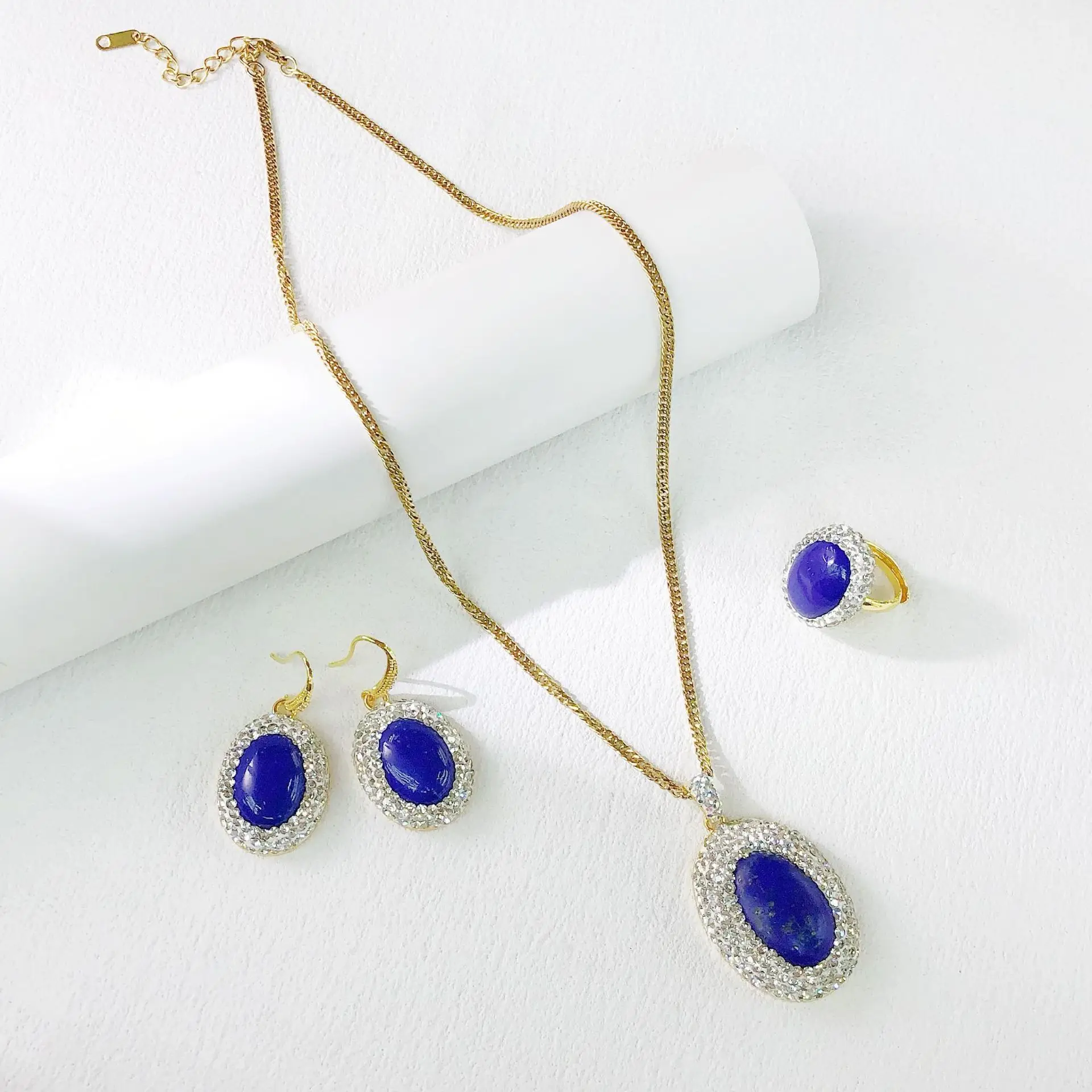 

Afghanistan lapis lazuli necklace index finger ring earrings stud earrings designer niche personalized three-piece jewelry