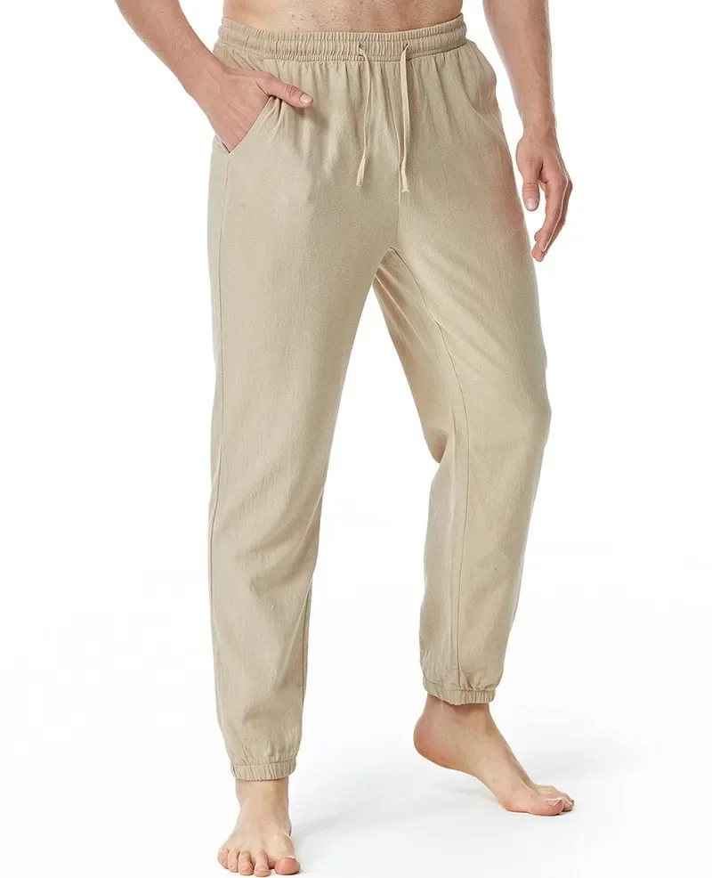 Pantalones informales de alta calidad para hombre, pantalón holgado de Color sólido con cordón y bolsillos de tiro medio, para primavera y verano