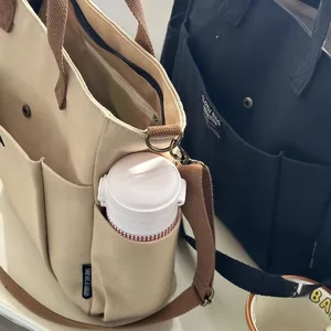Kentsel, minimalist, kız öğrenci, büyük kapasiteli seyahat yatay tuval tek omuz çapraz çapraz laptop çantası için Borsa ekranının ilk 10 satışı, asa-no. 6