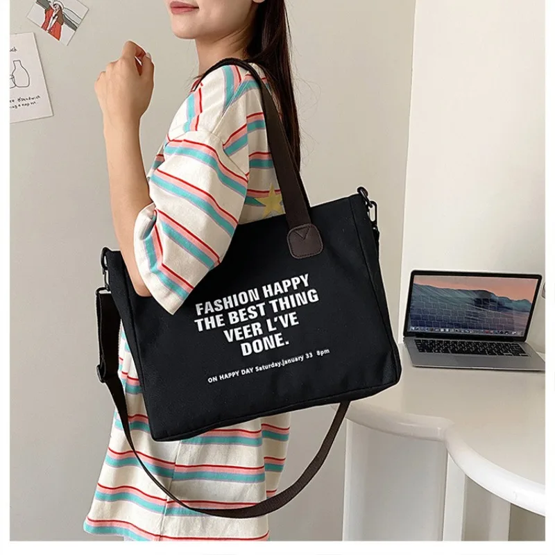 Tote borsa di tela di grande capacità stampa di lettere Design alla moda 2023 nuova borsa a tracolla a tracolla moda per studenti in stile Preppy Casual