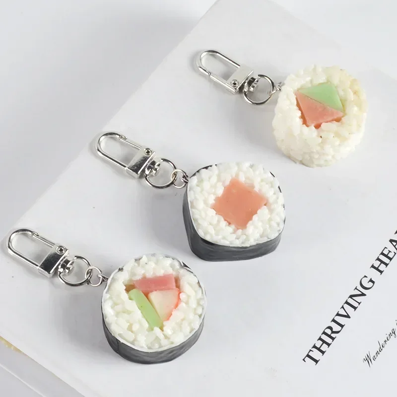 Llavero de sushi japonés simulado, miniatura creativa de comida, modelo de rollo de arroz y verduras, colgante para teléfono móvil de estudiante, regalo de joyería.