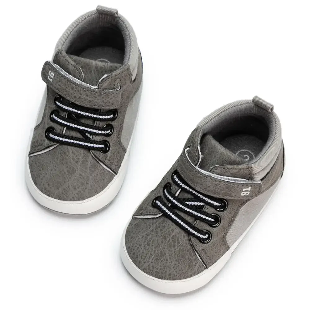 Quattro stagioni neonato tinta unita tela scarpe casual PU scarpe sportive bambino antiscivolo fondo morbido primo giorno scarpe da bambino