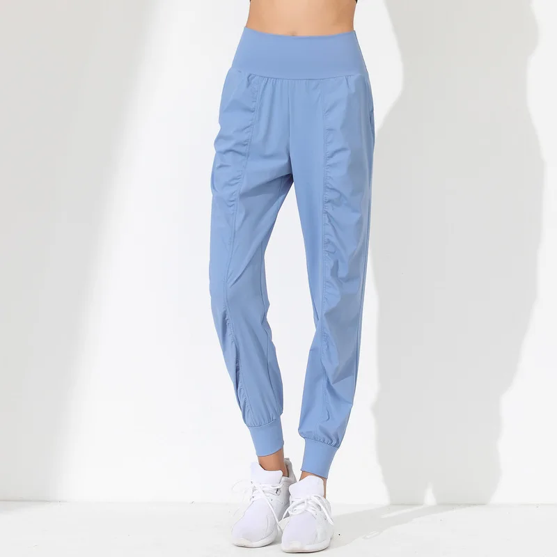 Spodnie do jogi dla kobiet Luźne, wąskie, szybkoschnące spodnie do jogi Plisowane spodnie do biegania Fitness Capris Kieszenie Spodnie do joggingu Spodnie sportowe