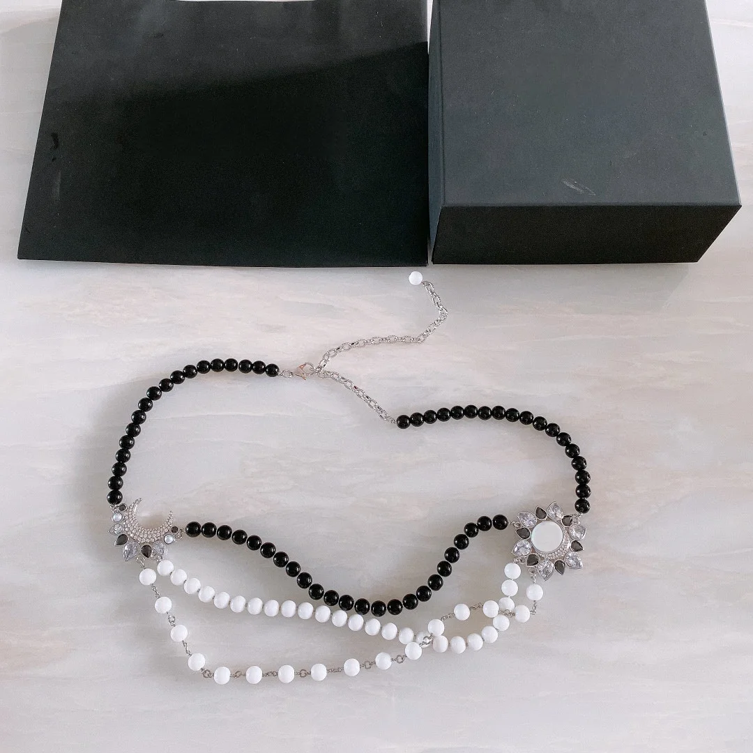 

Fashion brand black and white pearl rhinestones brass metal delicate waist chain