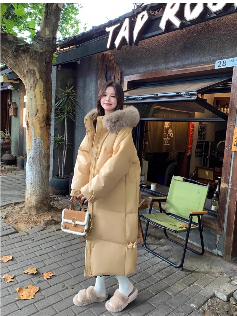 Winterjas Warme bontkraag Capuchon Dames Parka Mode Ritszakken Ontwerp Lange jas Elegante slanke dikke vrouwelijke jassen