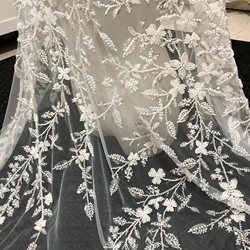 Exquisite And Unique Sequined Beadwork On A Thin Chiffon Embroidered Wedding Gown With Lace Fabric
