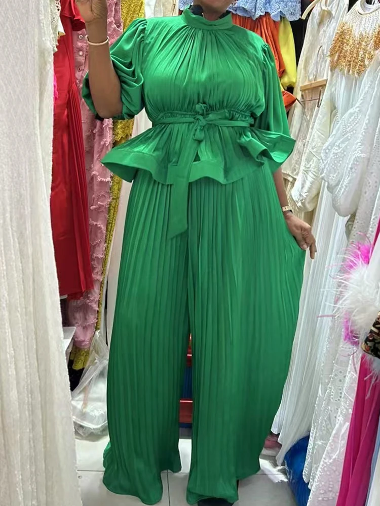 

In the summer of 2025, the new fashion women's trousers pleated short-sleeved top+high-waist wide-leg trousers two-piece suit.