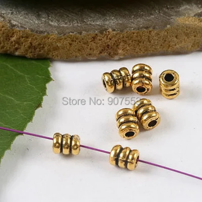 100pcs 5.2x4mm hole is 1.5mm Tibetan Silver  Dark Gold Color  Spiral Tube Spacer Beads H2056