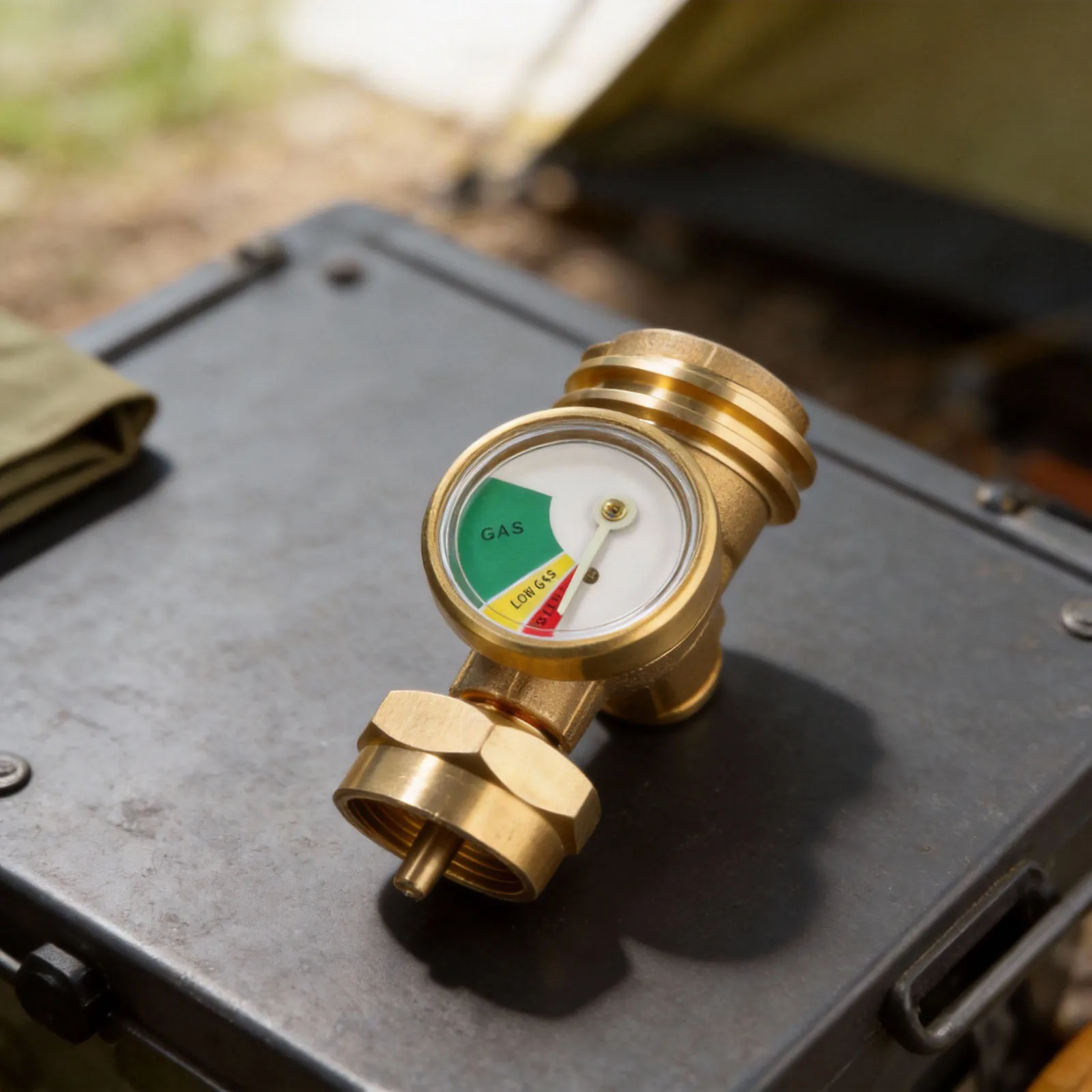 

Gas adapter for European propane cylinders with built in pressure gauge and hand tightened design compatible with devices