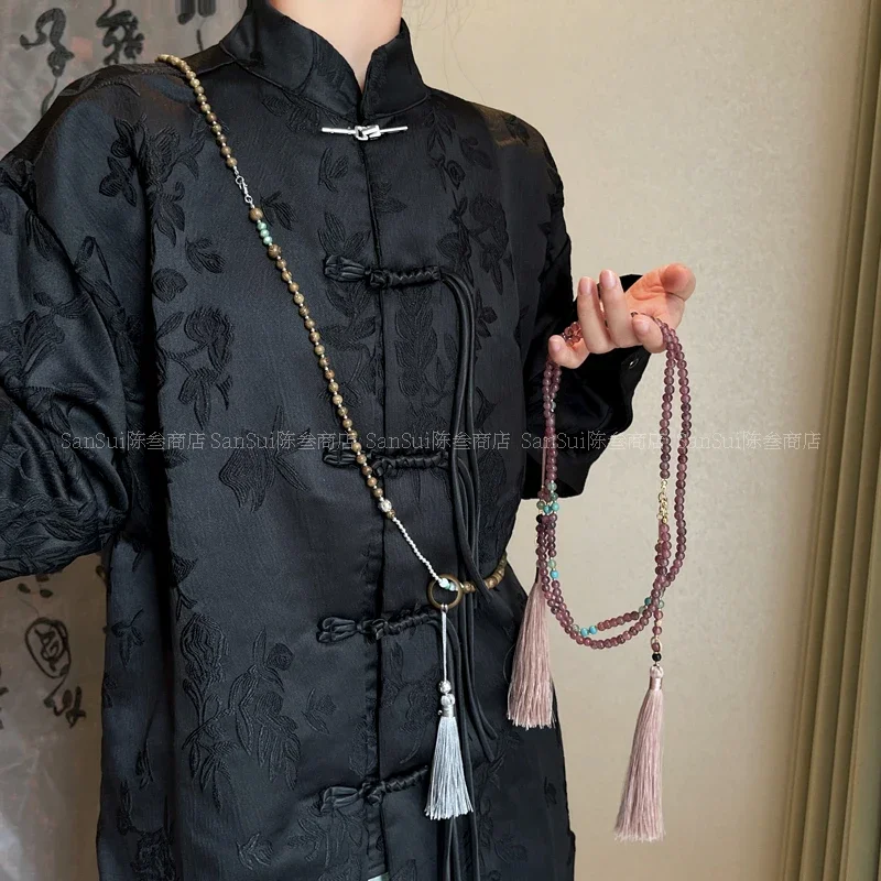 

A long necklace with multiple wooden beads and tassels for women's new Chinese style crossbody chain accessories