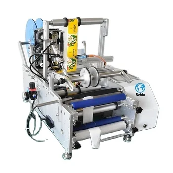 

Настольная полуавтоматическая этикетировочная машина для круглых бутылок с самоклеящимися этикетками и компонентами PLC для бумажной упаковки