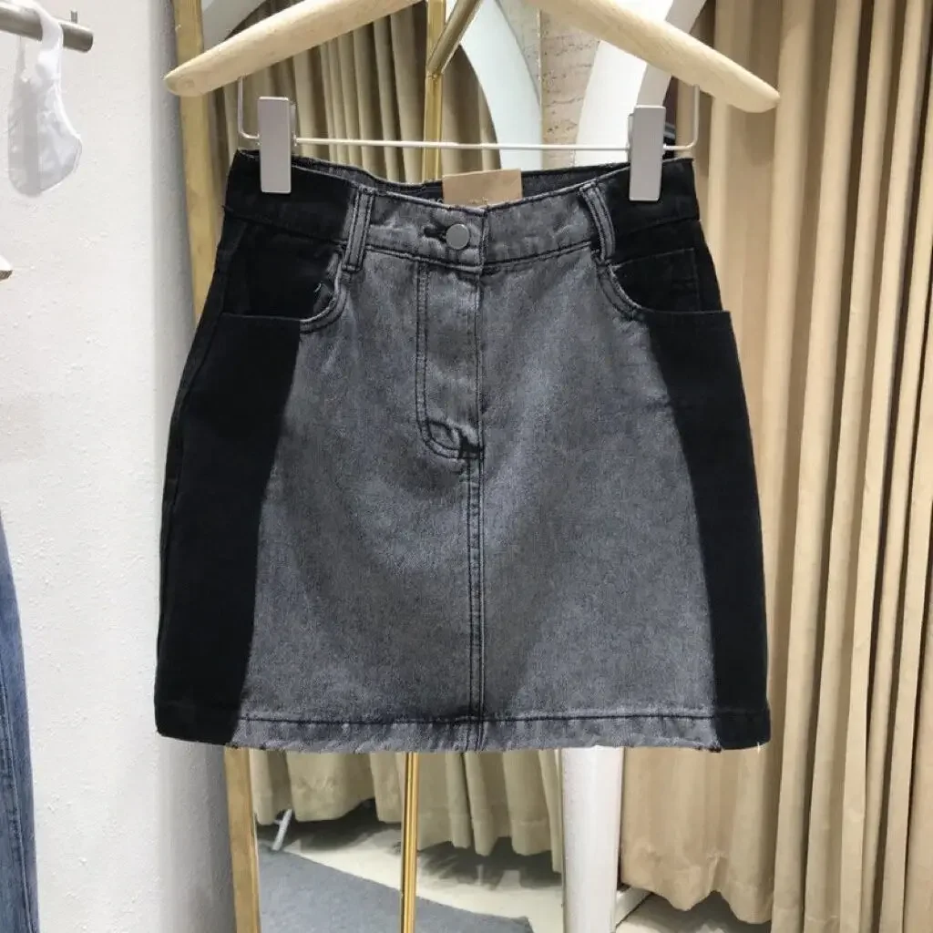 

French stitching contrast denim skirt women's spring and autumn new fashion temperament simple design sense bag hip skirt.