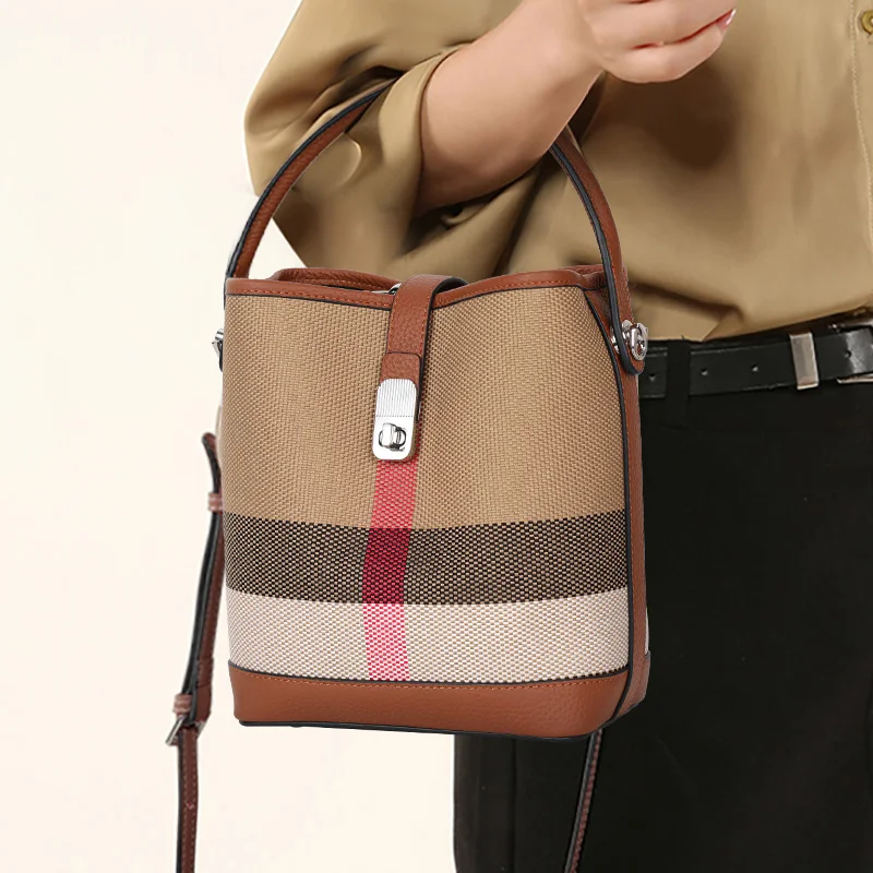 

New canvas paired with cowhide women's shoulder crossbody bag, fashionable plaid pattern bucket bag