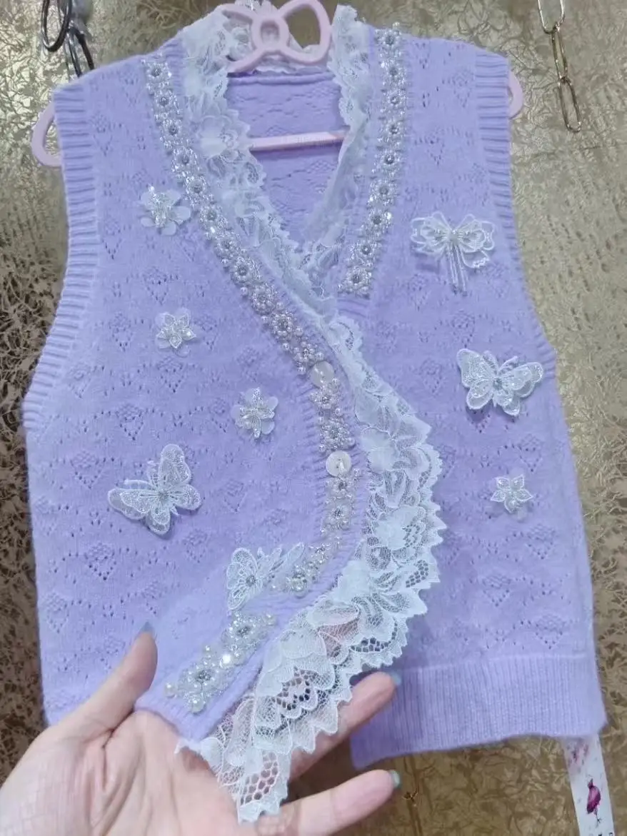 فاخر فريد تصميم المرأة تريكو سترة سترة صوف من دون أكمام اتجاهات 2025 الخريف محبوك ملابس امرأة