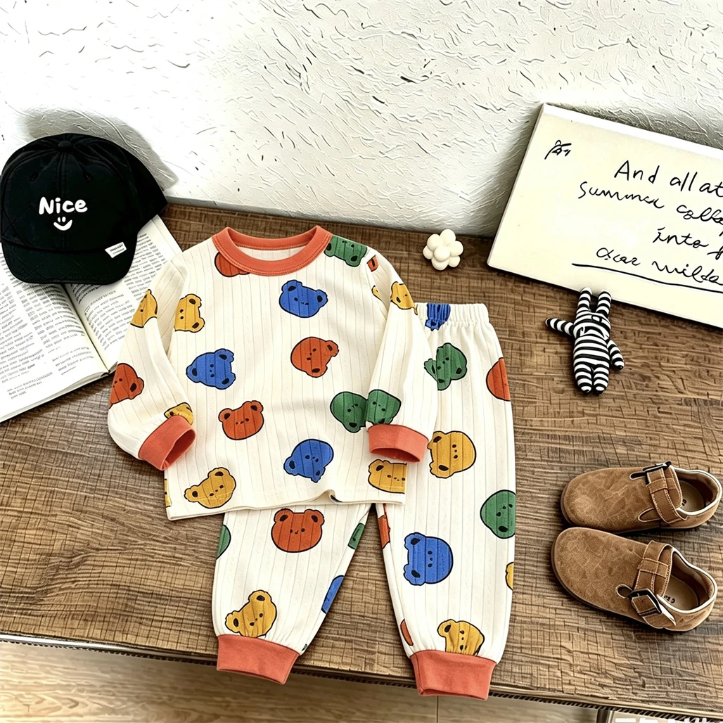 Kleinkind Langarm-Schlafanzug Set mit Allover-Print Oberteil + Hose 2026 Frühling Herbst Kleidung Kinder Neuer Cartoon Pyjama Zweiteiliges Set