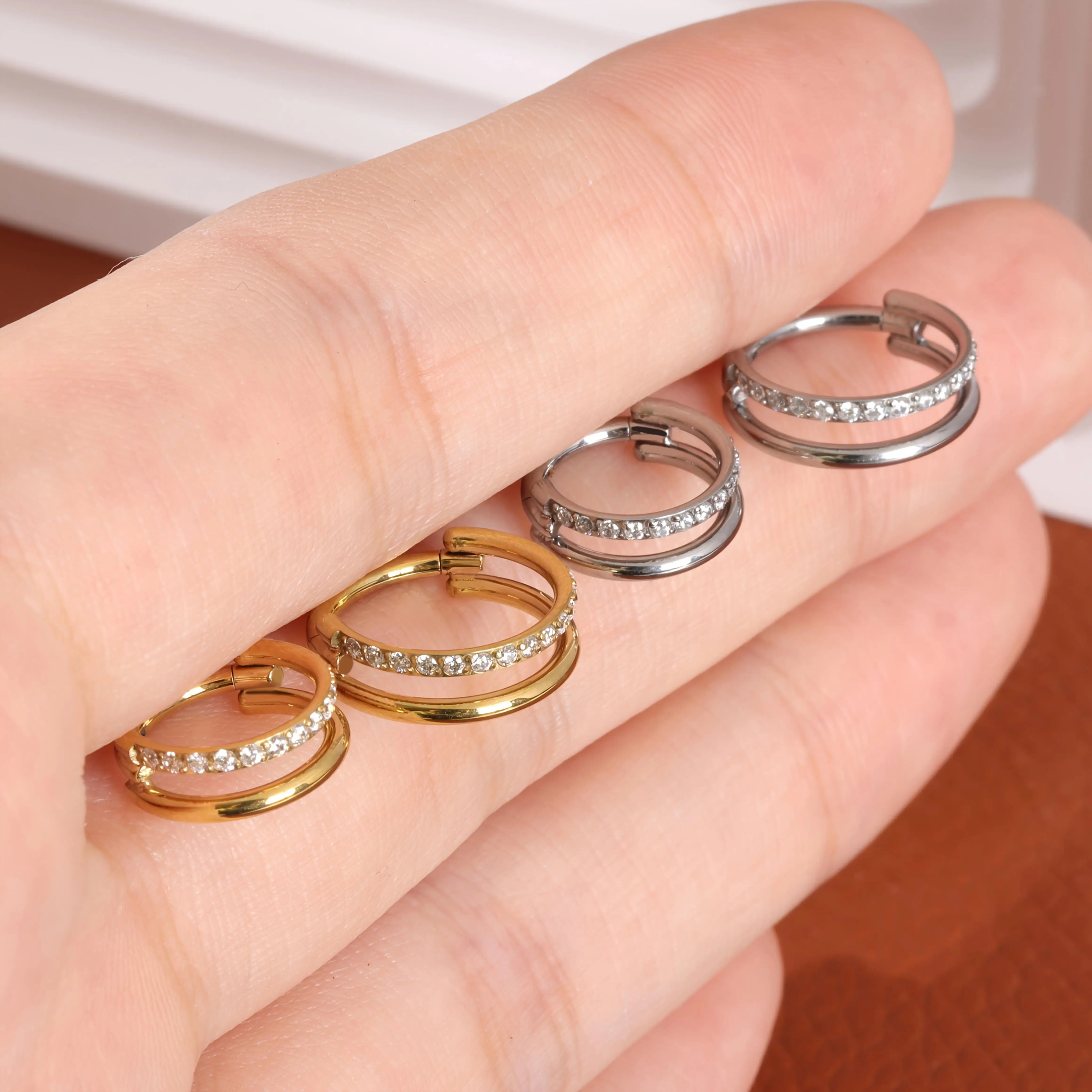 16G التيتانيوم الزيركونيا مزدوجة حلقة حلقة الفضة الذهبية حلقة دايث حلقة أقراط مفصلات ثقب المجوهرات مزدوجة حلقة النظر