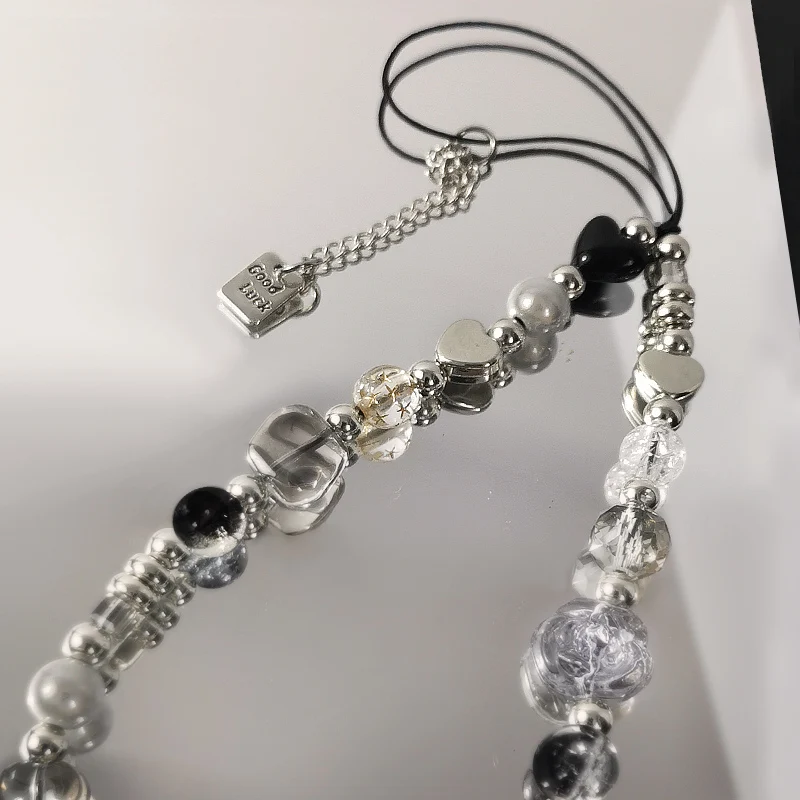 سلسلة سحر الهاتف المحمول العالمية الرجعية ، قلادة الكاميرا القصيرة ، حالة الهاتف الإناث ، مكانة باردة ، الأسود والأبيض ، الحبل ، الحلو