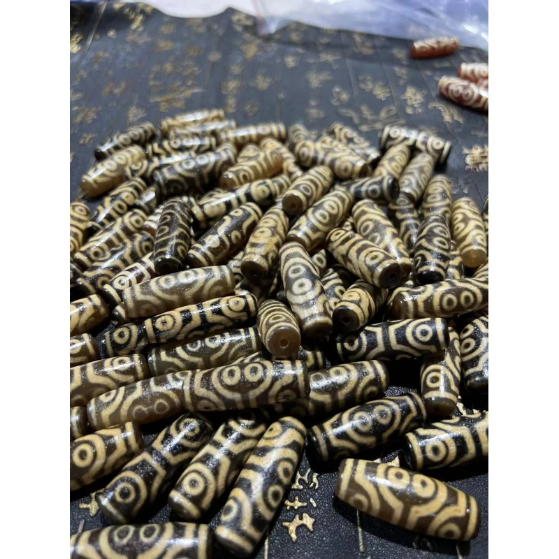 

Factory Wholesale High Oil Coated Pulp Weathering Delicate 40mm Old Tooth Yellow Tibet Beads