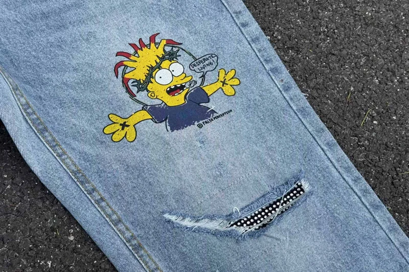 เย็บปักถักร้อยการรับรู้ปลอมเพชรการ์ตูน Graffiti กางเกงยีนส์ผู้ชายผู้หญิงคุณภาพสูง Hip Hop เสียหลวมตรงกางเกงยีนส์