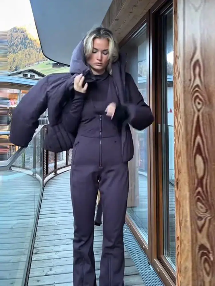 ชุดสกีแบบจั๊มสูทแฟชั่นสำหรับผู้หญิง กันลม แขนกุด ซิป ทรงเข้ารูป รุ่นใหม่ ฤดูใบไม้ร่วง ฤดูหนาว 2025 ชุดสโนว์สูทแบบออลอินวัน