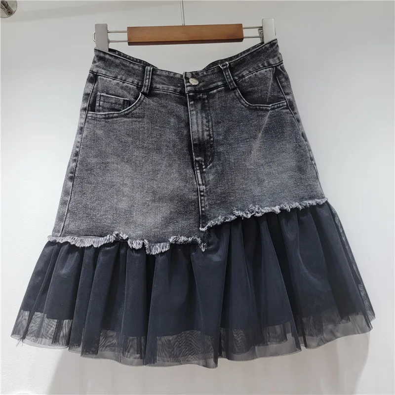 

Denim & Mesh Skirt. A high-waist A-line skort with edgy contrast & a slimming fit. Summer 2025.