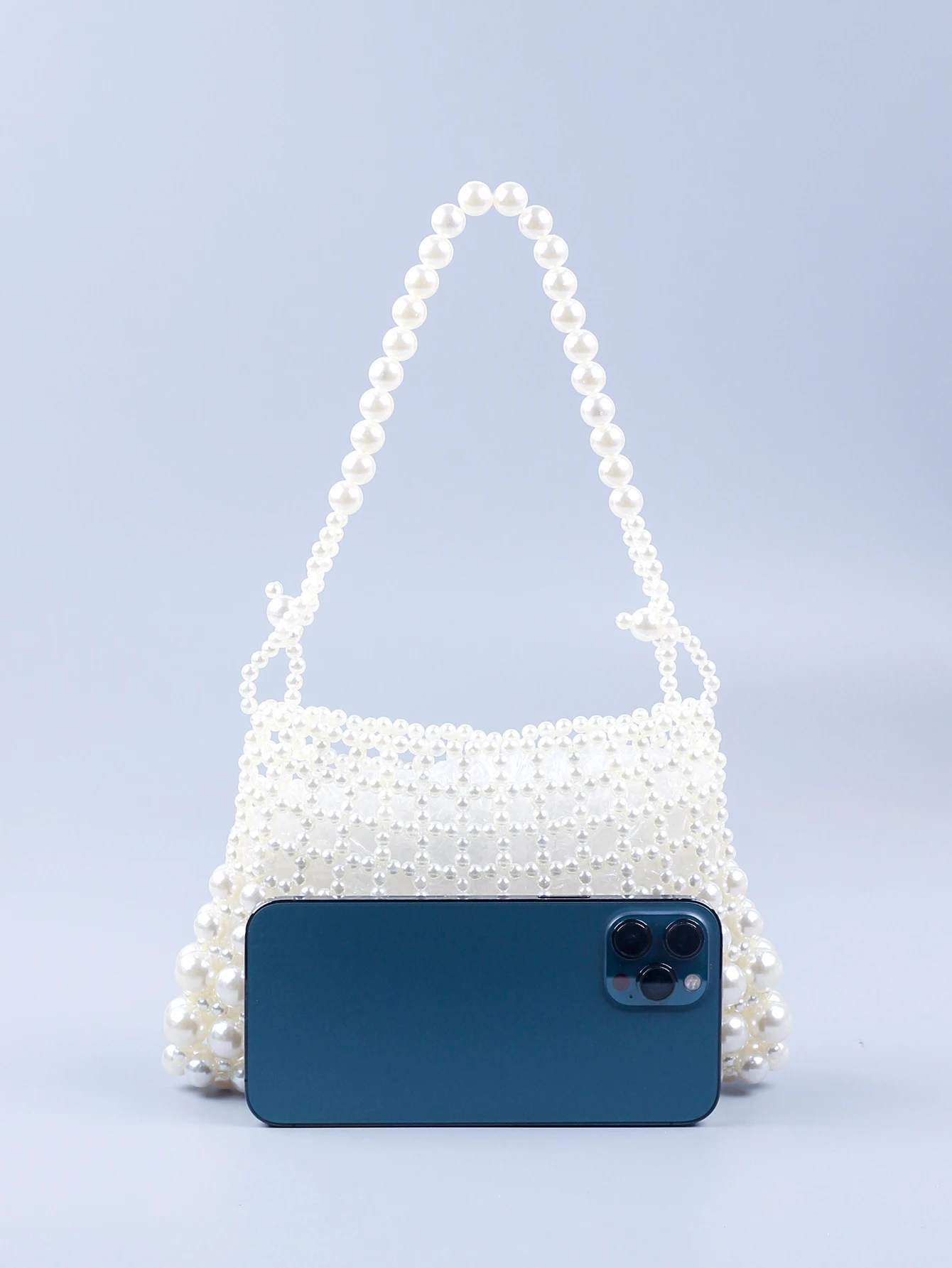 New internet celebrity 2024 Pearl Bag Women\'s Handmade Hollow Beaded Bag French Retro Handheld Women\'s Bag