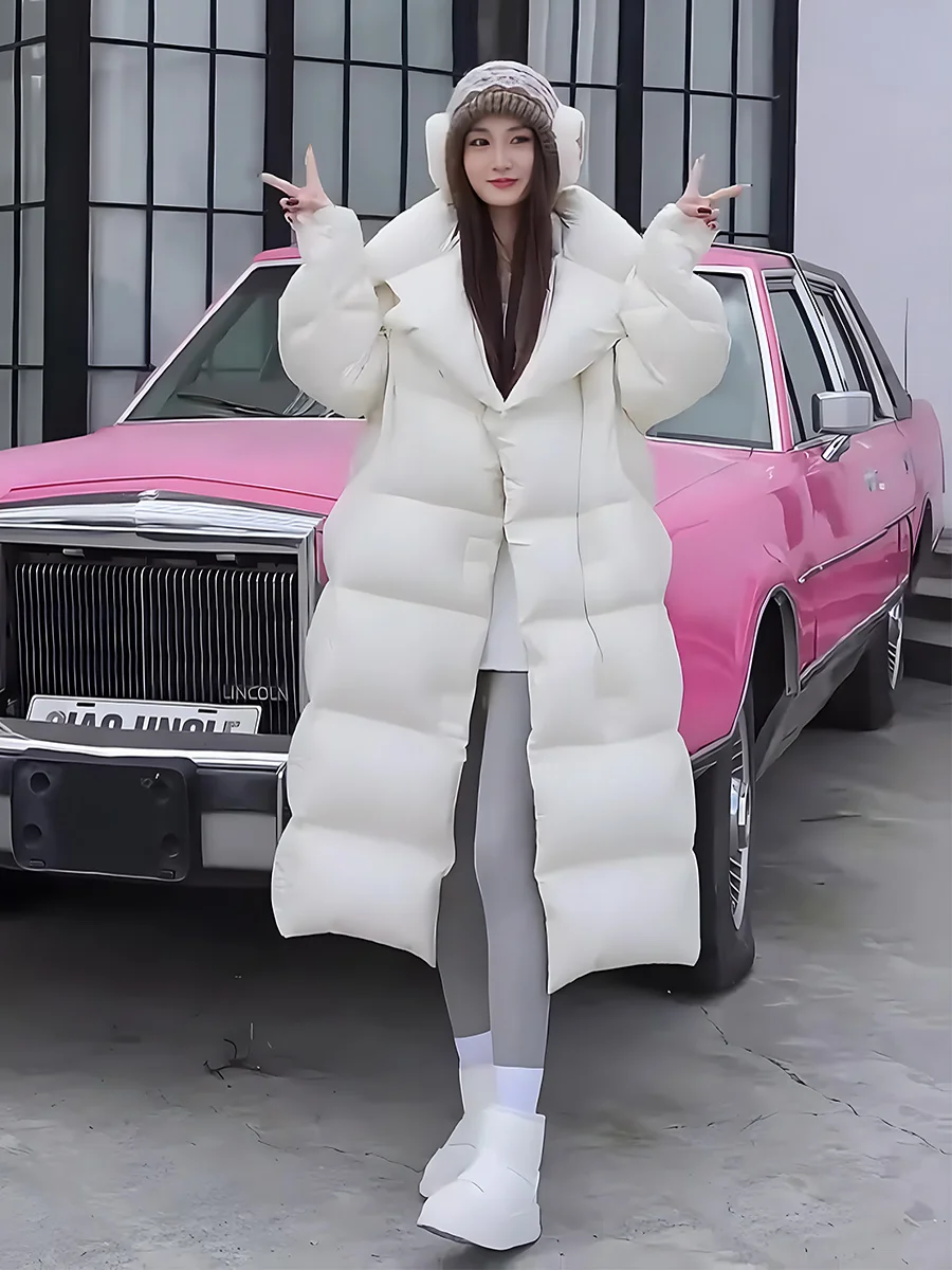 Faionable largo de plumas para mujer Jaet 2025 invierno nueva llegada Thiened Floing cuello grande blanco Du abajo abrigo para damas