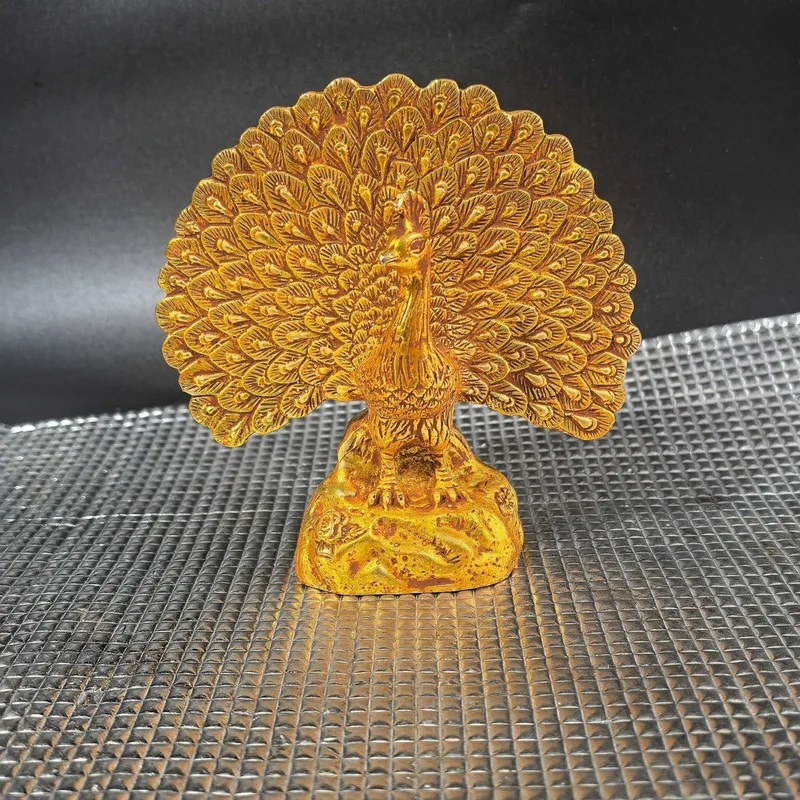 Antique-style, distressed brass peacock figurine with gilded details, a decorative piece for the home, a copper peacock animal o