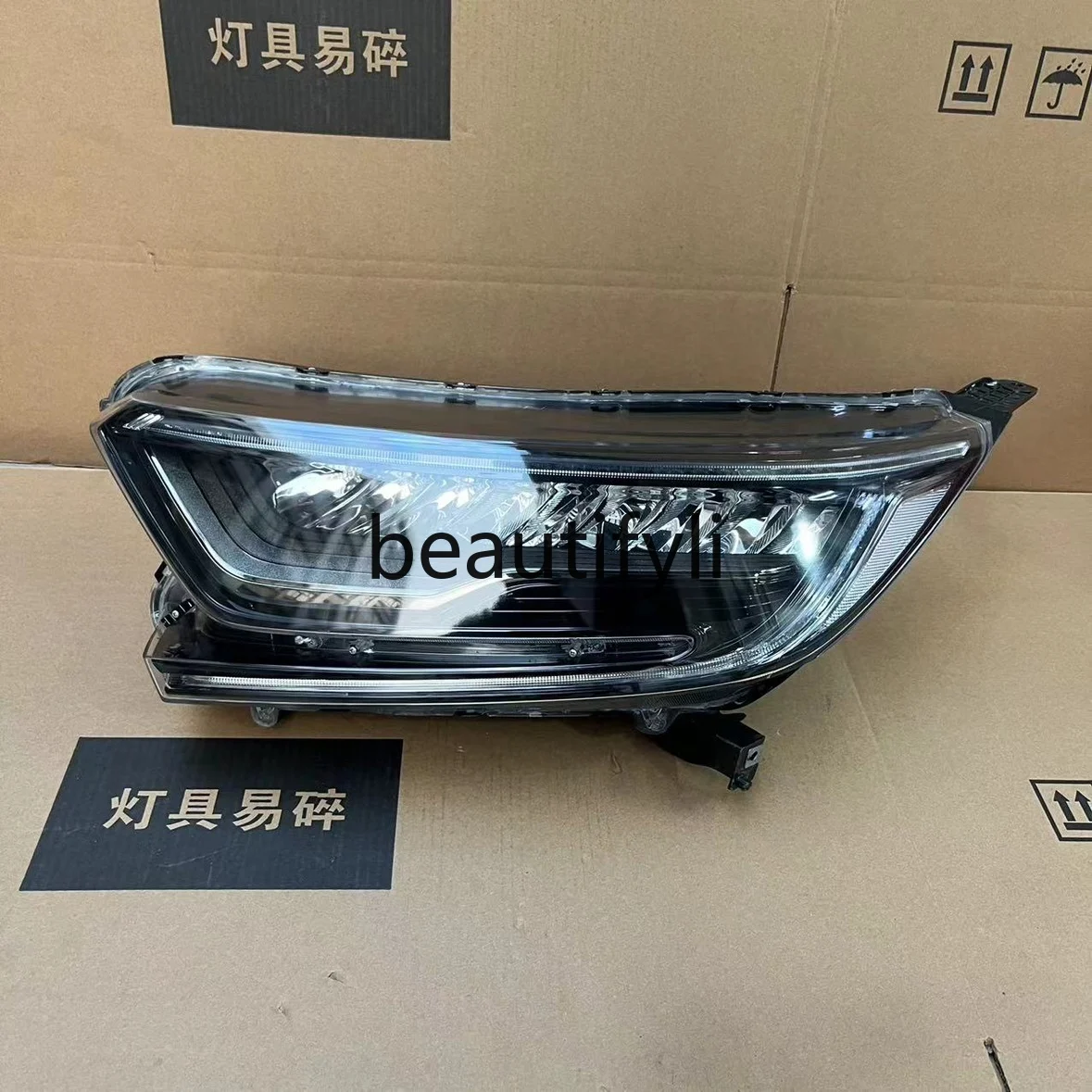 

Modified high-end LED headlight assembly is genuine.