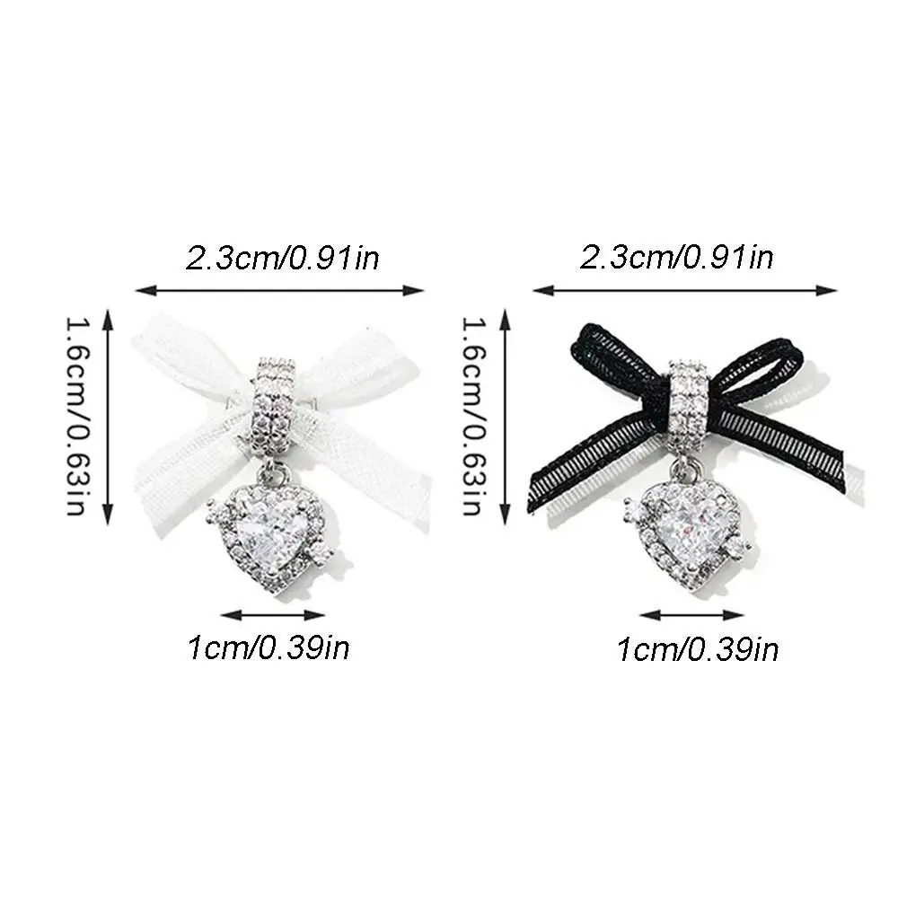 1 個マニキュア装飾品ジルコンネイルアートアクセサリーオーガンザリボン絶妙なハートジルコンペンダントネイルチャーム光沢のある金属