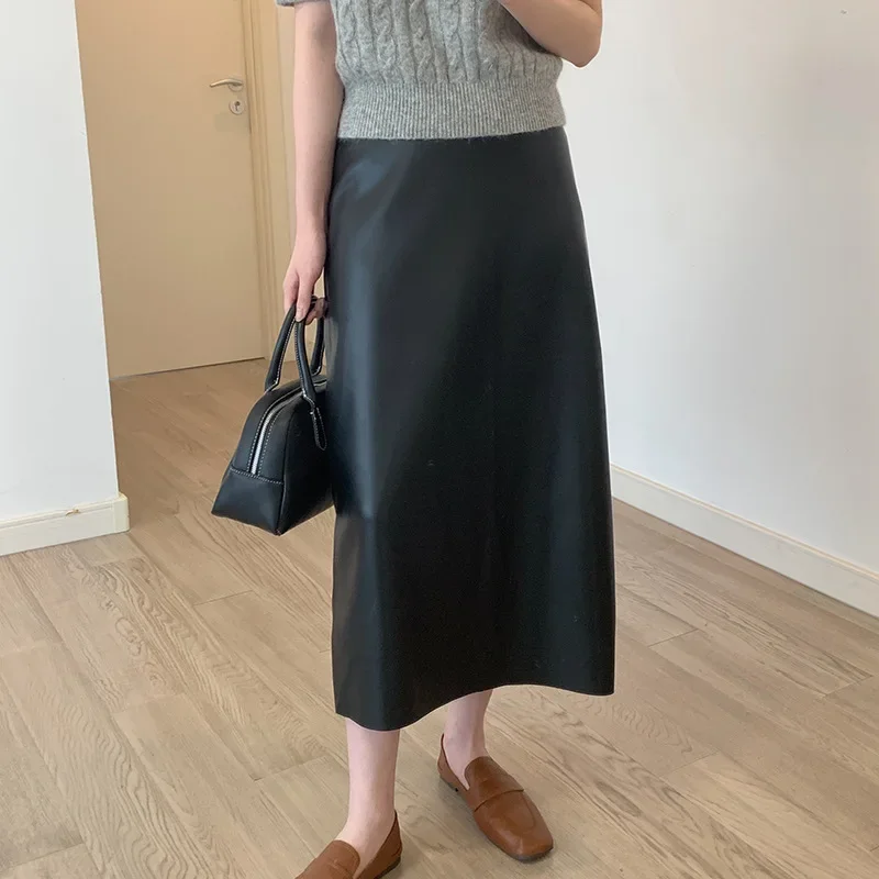 2025 women's simple style high waist half-body leather skirt, rear split fork, medium and long PU leather skirt