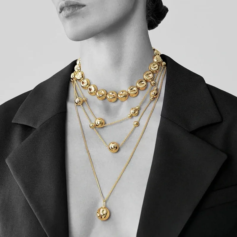 

Niche design irregular concave golden ball long necklace light luxury high-end layered sweater chain women's fashion accessory