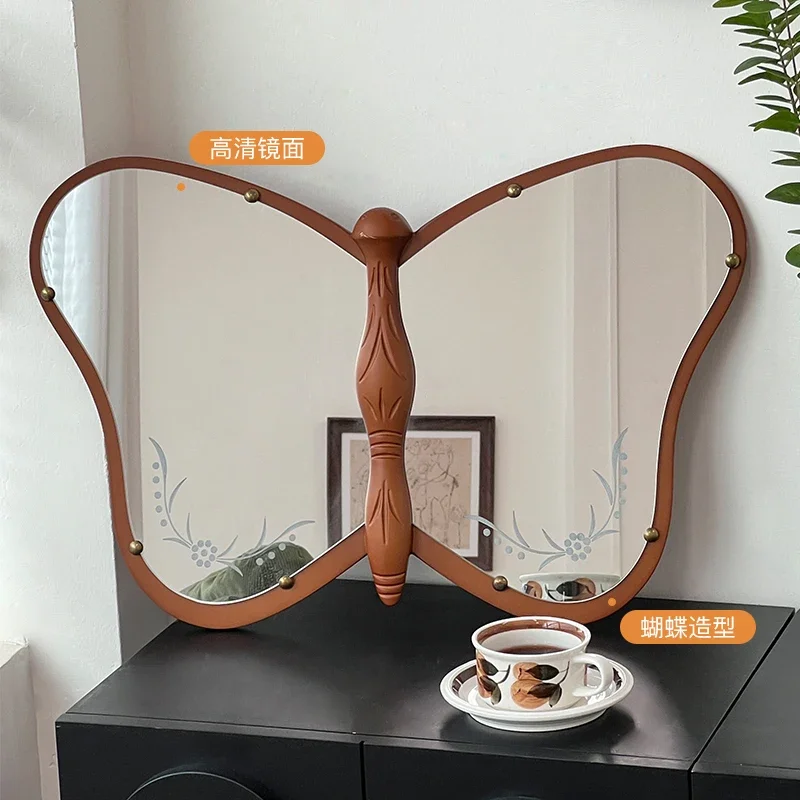 Simple medieval butterfly mirror...