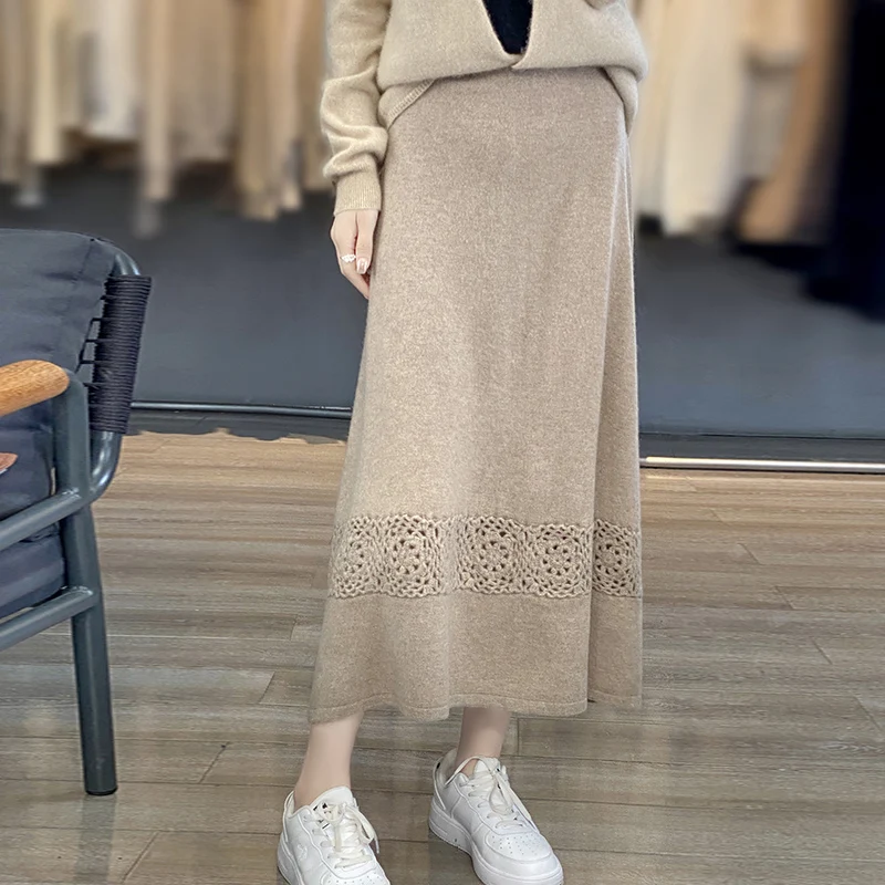 Autumn and winter new 100% wool skirt sweater hollow crocheted high waist A-line skirt in the long knee-length skirt.