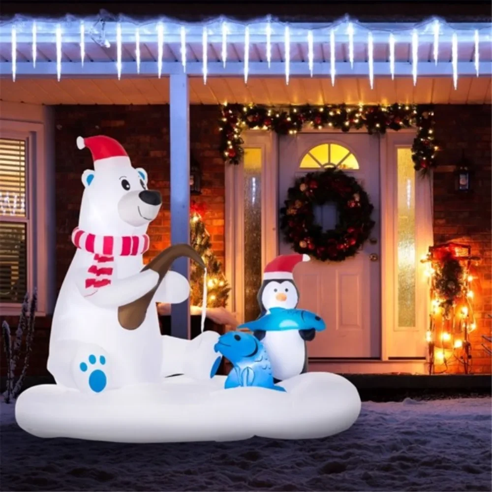 Christmas polar bears in Santa hats and penguin fishing in an inflatable boat combine a cohesive Christmas display with LEDs